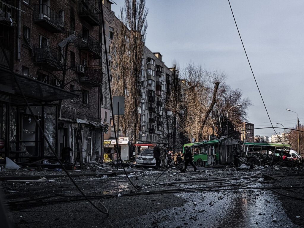 destroyed city with crashed bus
